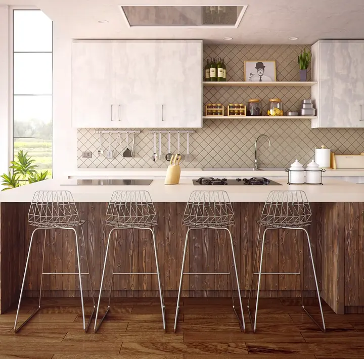 Bright, tidy kitchen with open shelves and bar stools