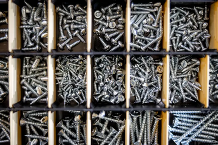 Organized compartment box of screws and hardware