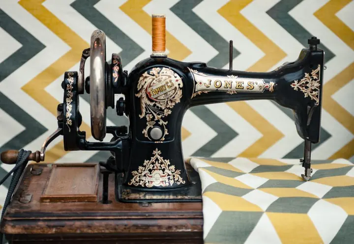 Vintage sewing machine on a patterned table