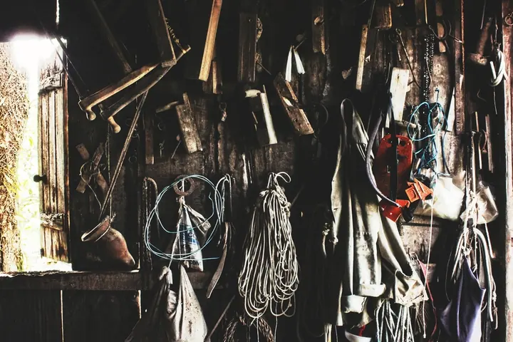 Tools neatly organized on a pegboard wall